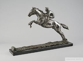 A sterling silver sculpture of the racehorse Desert Orchid with jockey Richard Dunwoody up,