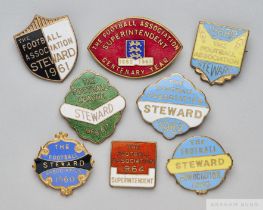 Eight gilt-metal and enamel Football Association Wembley Stewards badges, 1960s