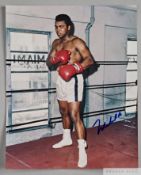 An autographed colour photograph of Muhammad Ali