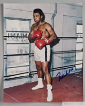 An autographed colour photograph of Muhammad Ali