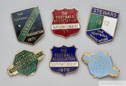 Six gilt-metal and enamel Football Association Wembley Stewards badges, 1970s
