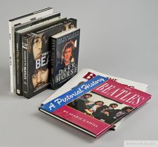 Twenty two assorted hardback books relating to The Beatles and its individual members