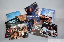Twelve classic vinyl albums by Status Quo