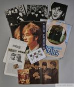Some interesting items related to The Beatles including a period lapel badge