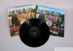 Two copies of The Beatles - Sgt Peppers Lonely Hearts Club Band