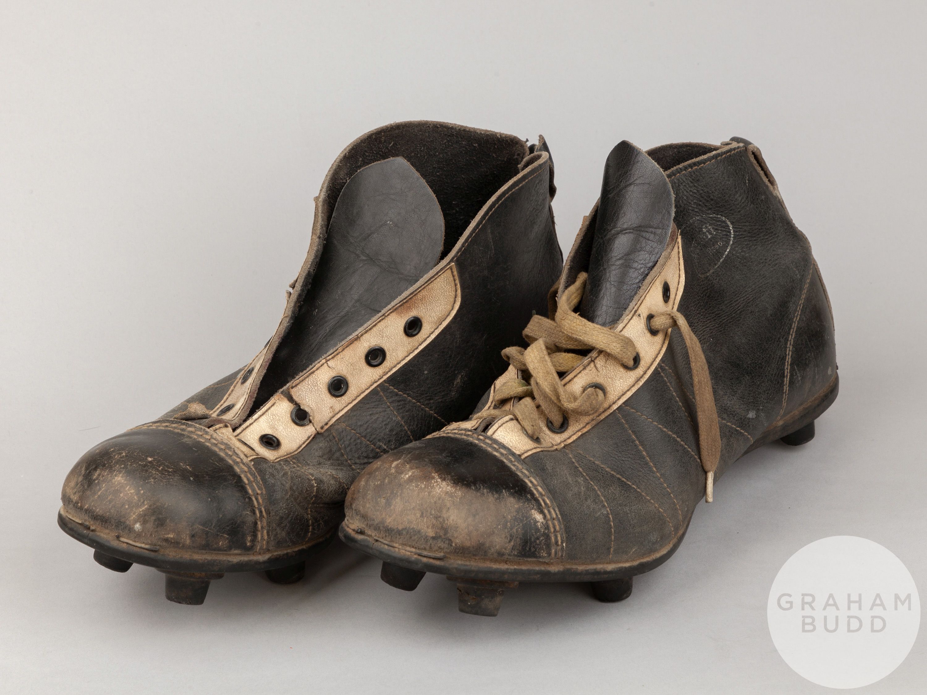 Pair of vintage leather football boots believed to have been worn by Mark Jones