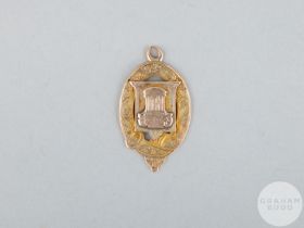 George Murdoch rare and early 9ct gold East of Scotland Football Association medal, 1893