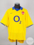 Dennis Bergkamp yellow and blue No.10 Arsenal v. Rangers short-sleeved shirt, 2003-04