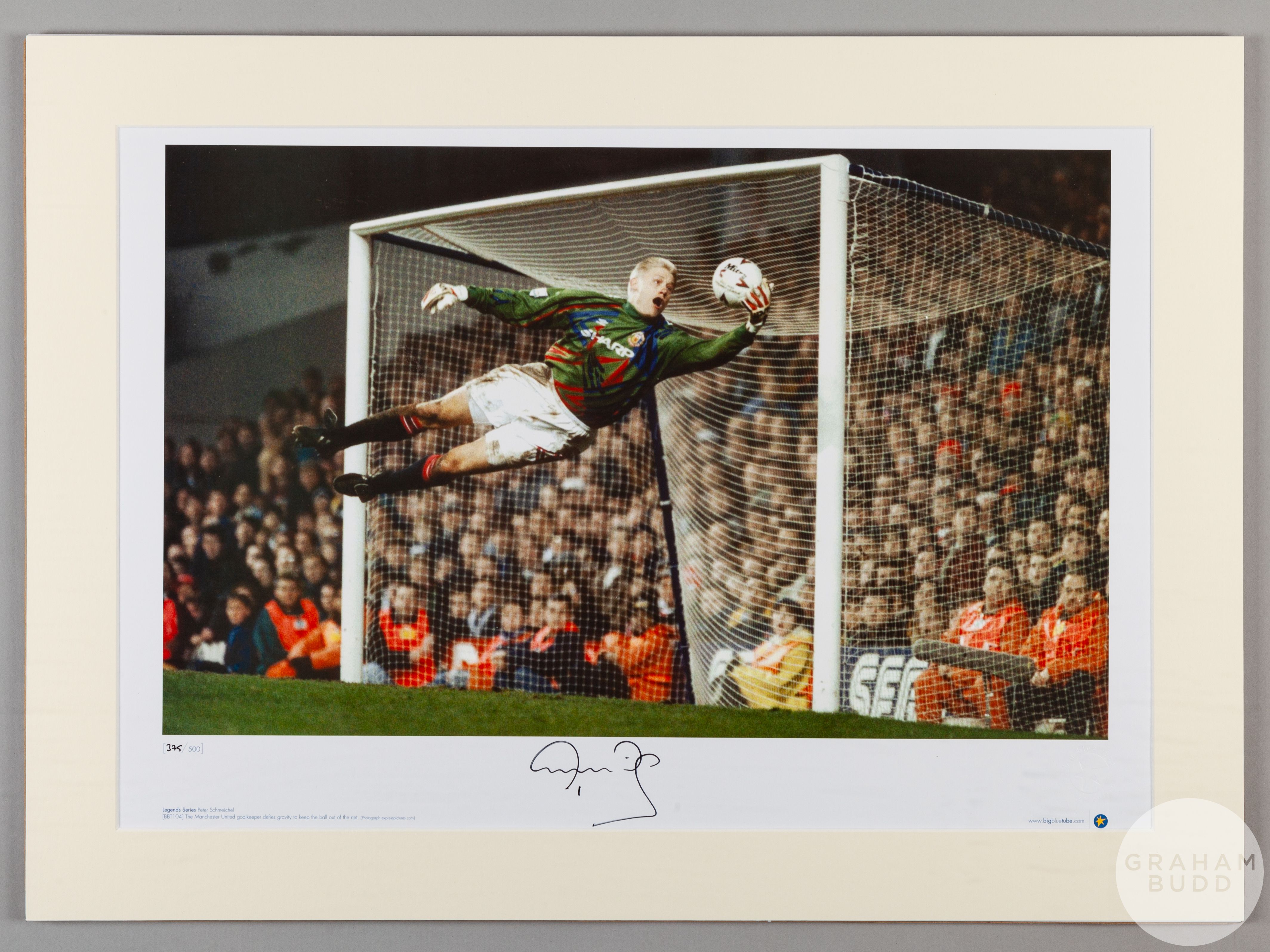 A large colour photographic print of Peter Schmeichel playing for Manchester United.