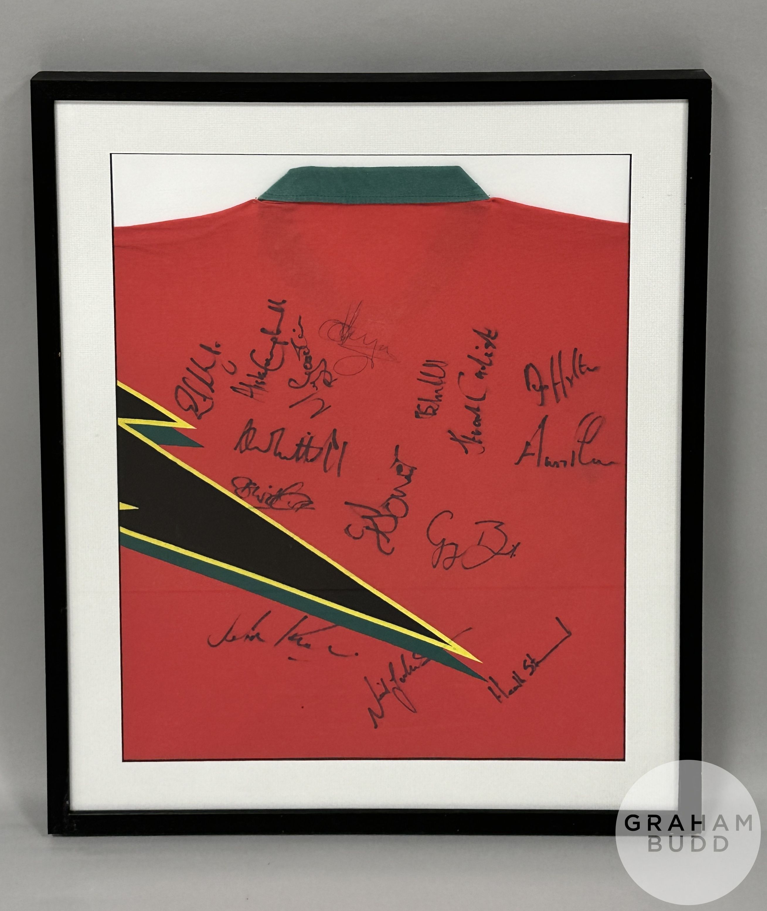 Multi-signed red Zimbabwe cricket shirt 2000 display,