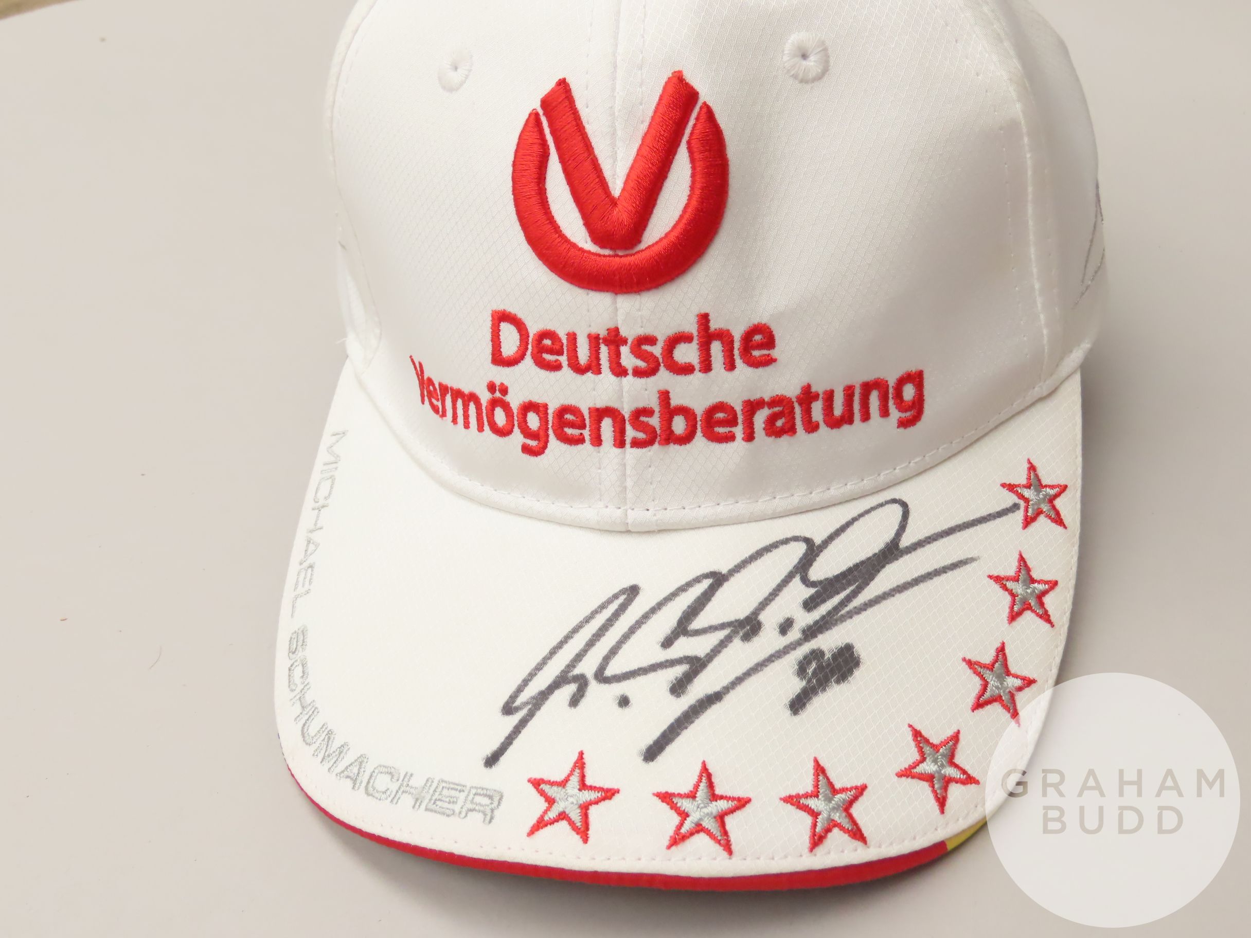 Michael Schumacher signed Deutsche Vermogensberatung white cap,