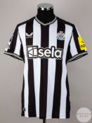 Bruno Guimaraes signed black & white striped Newcastle United No.39 home shirt, season 2023-24,