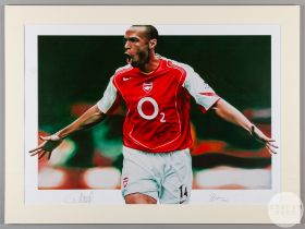 large colour print of Thierry Henry in an Arsenal home kit.