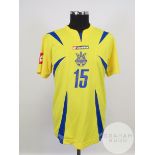 Artem Milevskyi yellow and blue No.15 Ukraine match worn short-sleeved shirt, 2006