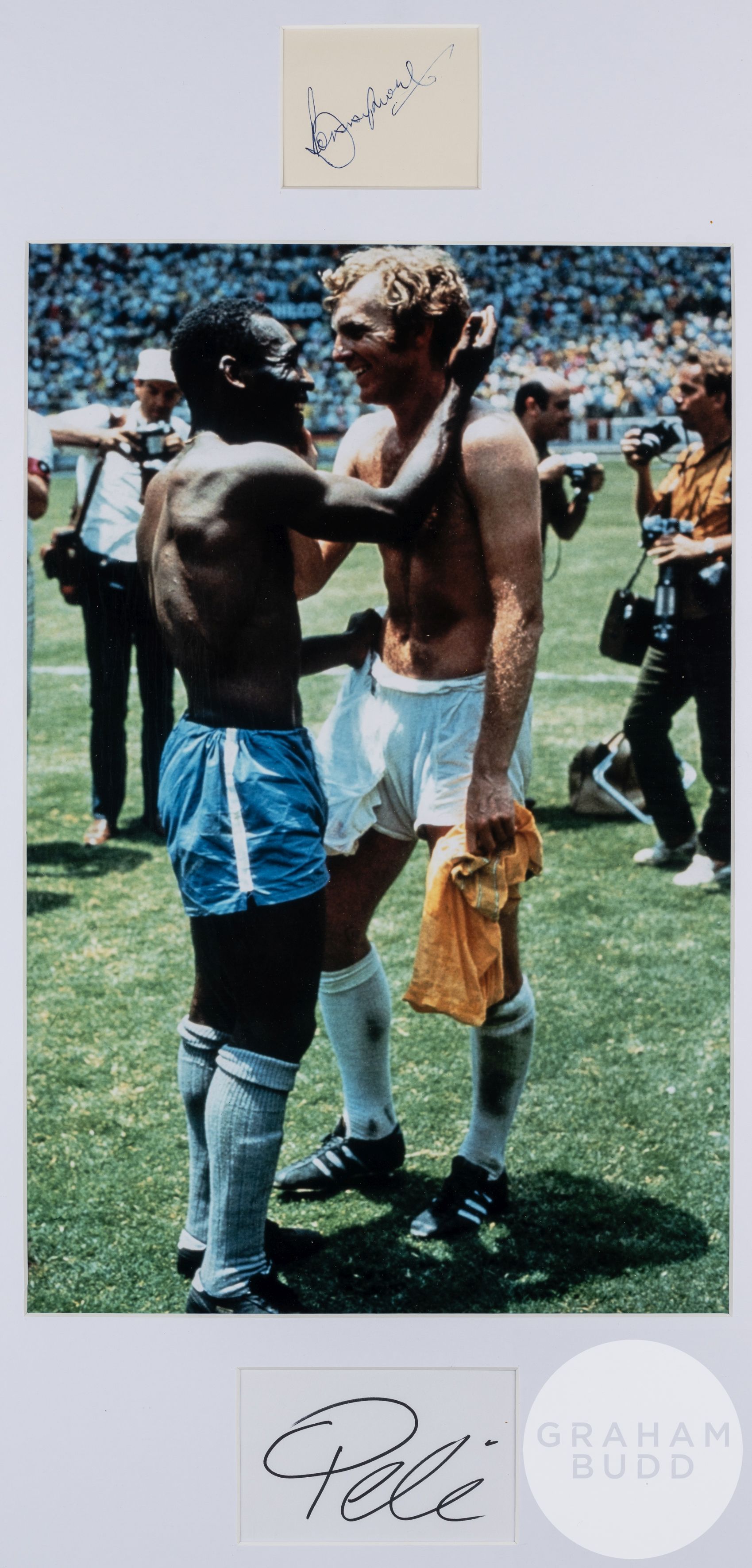 Bobby Moore and Pele double-signed 1970 World Cup shirt swap framed photographic display,