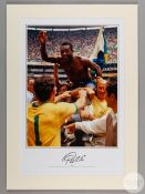 A large colour photographic print of Pele following Brazil's victory over Italy in the 1970 World Cu