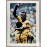 A large colour photographic print of Pele celebrating scoring Brazil's 100th World Cup Goal