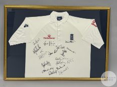 Multi-signed white England cricket shirt display,