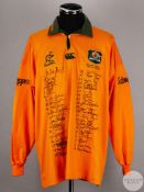 A yellow and green squad signed Australia 1996 Tour of Italy, UK and Ireland replica shirt