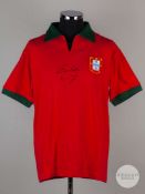 A TOFFS replica Eusebio autographed Portugal short-sleeved shirt.