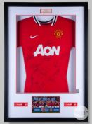 Red Manchester United squad autographed shirt, 2010-11.