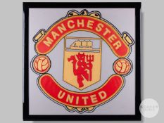 Rare large embroidered Manchester United crest, 32 x 32in.