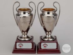 Two miniature Champions League trophies, 1999 and 2008