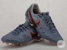 A pair of Hugo Lloris grey Nike Tiempo football boots.