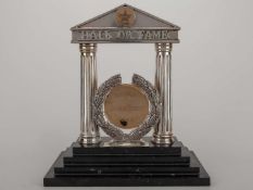 Johnny Carey a silver Caltex Hall of Frame Trophy, 1964