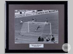Large original black & white photograph of Norman Whiteside scoring the winning goal in 1985 Final