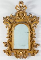 Specchiera in legno intagliato e dorato, Emilia, fine del XVII - inizi del XVIII secolo. Cornice