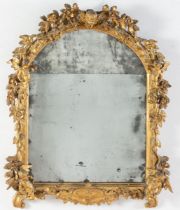Specchiera in legno intagliato e dorato, Toscana, XVIII secolo. Cornice riccamente lavorata a
