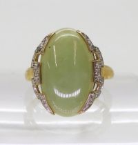 A QVC green hardstone and diamond ring, size O1/2, weight 5gms Condition Report:Available upon