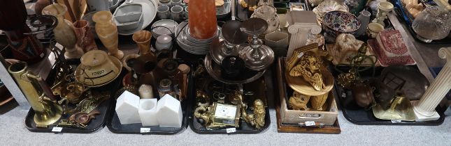A collection of brass and metalware items including candlesticks, jugs, candlearms, lamps together