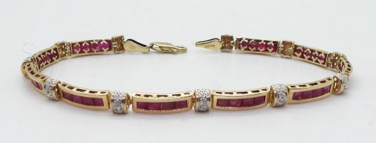 A 9ct gold red gem and diamond accent bracelet, length 18.8cm, weight 7.2gms Condition Report: