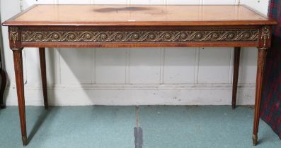 A 20th century Louis XVI style library table with rectangular top inset with embossed skiver over