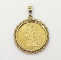 A 1911 full gold sovereign in a 9ct gold pendant mount weight 9.8gms Condition Report:Available upon