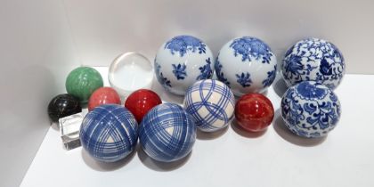 A collection of modern blue and white pottery balls and others Condition Report:Available upon