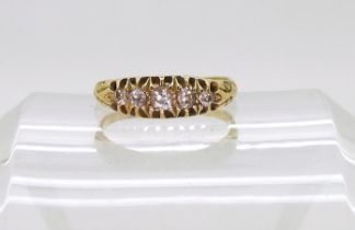 An 18ct gold five stone diamond ring (shank split) approx size O1/2 set with estimated approx 0.