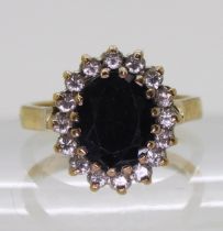 A 9ct gold sapphire and cz cluster ring size O1/2, weight 4.8gms Condition Report:Available upon