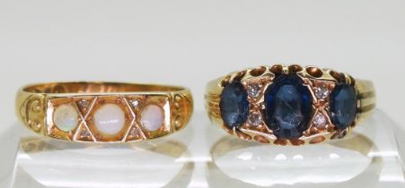 An 18ct gold three opal ring with rose cut diamonds, Chester hallmarks for 1903, size Q1/2 and a