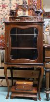 A lot comprising early 20th century mahogany glazed music cabinet (def) and two assorted mahogany