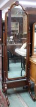A 20th century mahogany and walnut framed cheval dressing mirror, 164cm high x 50cm wide x 49cm deep