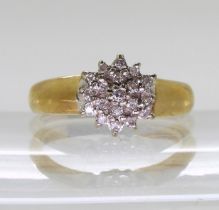 A 9ct gold diamond cluster ring set with estimated approx 0.10cts of brilliant cut diamonds,