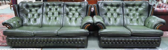 A 20th century green leather upholstered two piece Chesterfield style suite comprising high backed