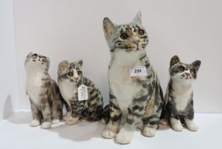 Four Winstanley tabby cats of varying poses and sizes Condition Report:Available upon request