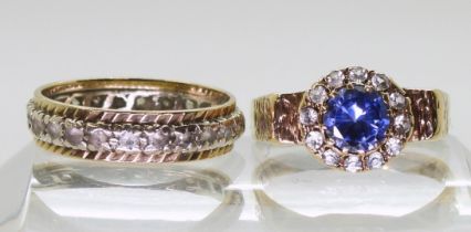 A 9ct gold clear and blue gem retro ring size P1/2, and a 9ct gold clear gem full eternity ring,