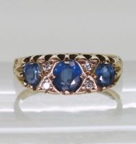 A 9ct gold sapphire and diamond ring, size K, weight 1.7gms Condition Report:Available upon request