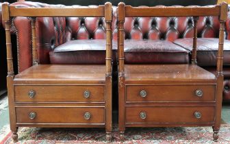 A pair of early 20th century mahogany bedside tables with galleried tops over open shelf with turned