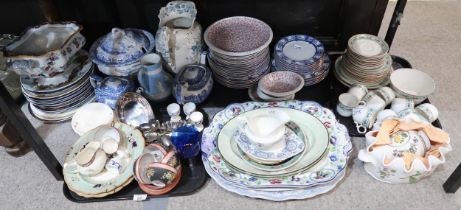 A collection of ceramics including large meat platters, blue and white table wares, Victorian teaset
